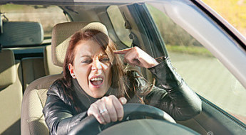angry-woman-gesturing-car-24090276