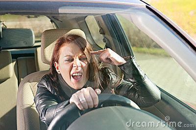 angry-woman-gesturing-car-24090276